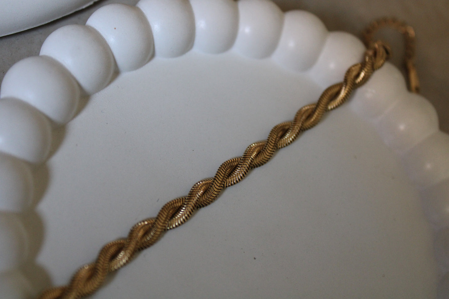 Gold-tone stainless steel twisted rope bracelet with a sleek, textured design. Tarnish-resistant, hypoallergenic, and perfect for layering or solo wear. Elevate your everyday style with this durable, elegant bracelet. Shop fashion jewelry at FashNotch!